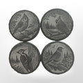 Slate Coasters set of 4 that have different birds engraved onto them like cardinal, tufted titmouse, robin, and pileated woodpecker