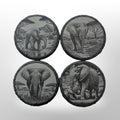 Set of 4 slate coaster set that has different images of elephants engraved onto them