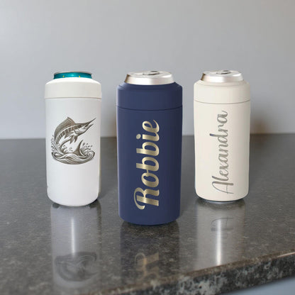 Three personalized can coolers on a gray surface with a plain background