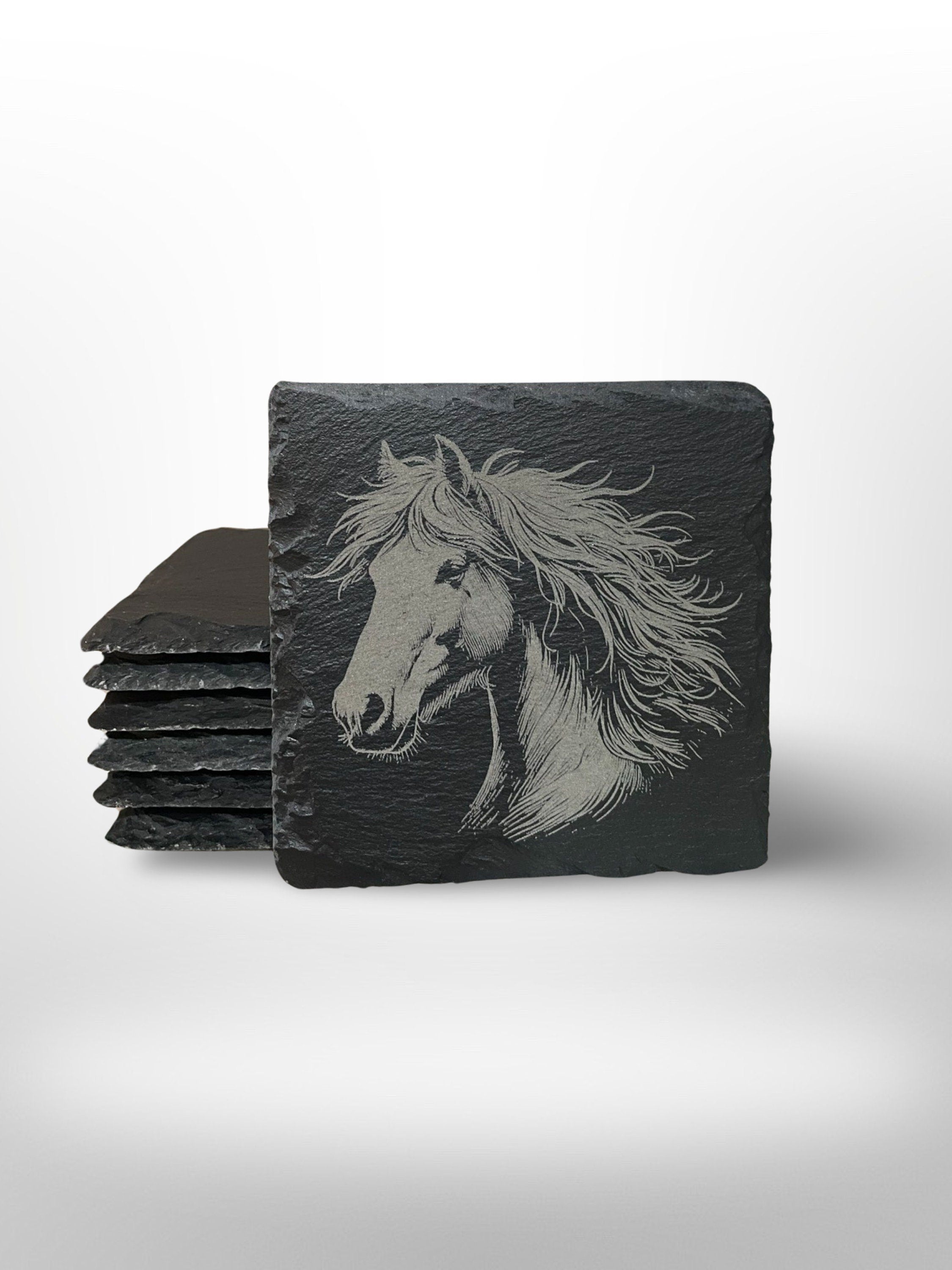 Slate coaster with a horse head engraved onto it