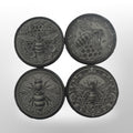 Set of 4 slate coasters with different honey bee designs engraved onto them