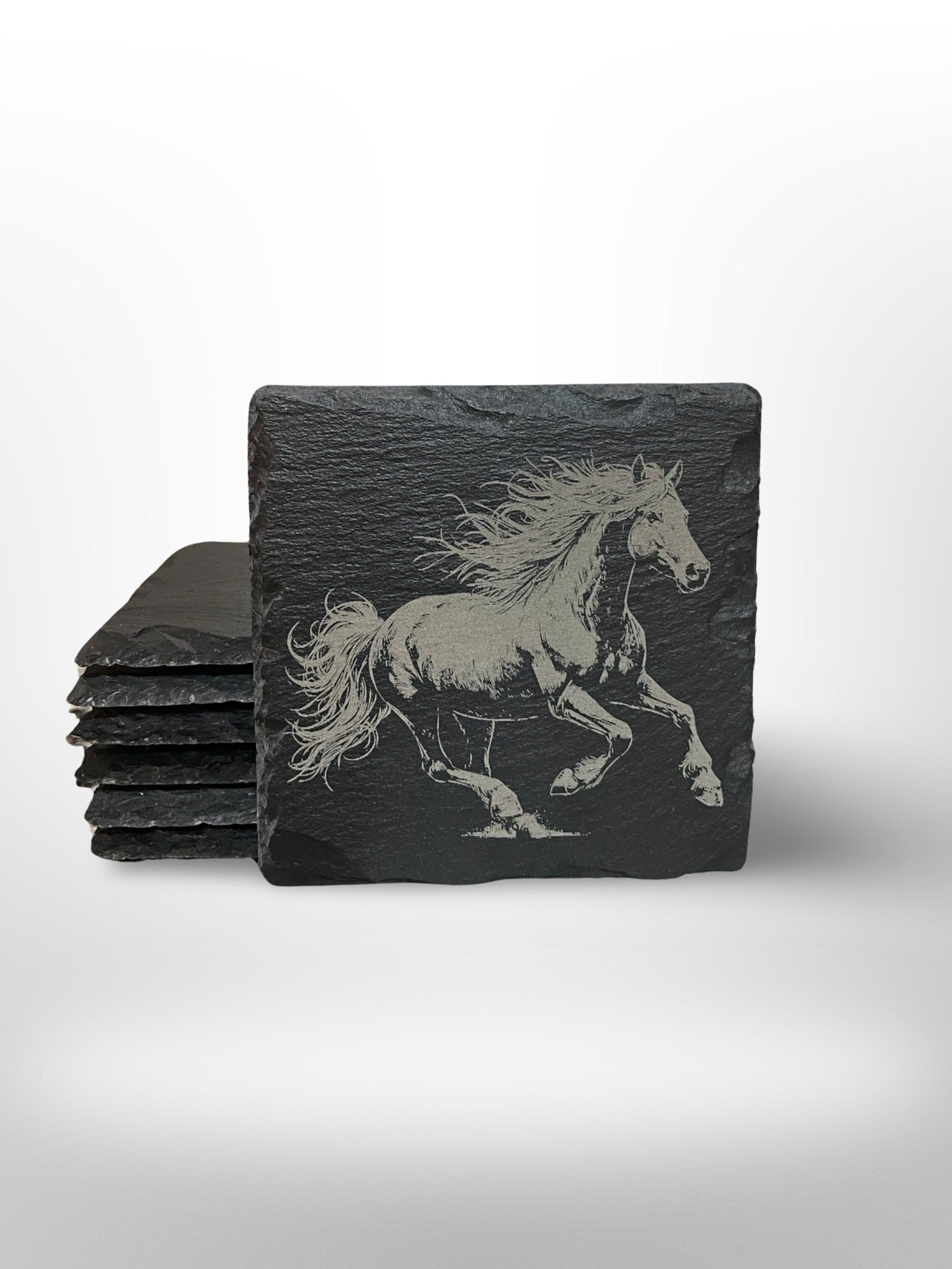 slate coaster with an image of a horse running on it