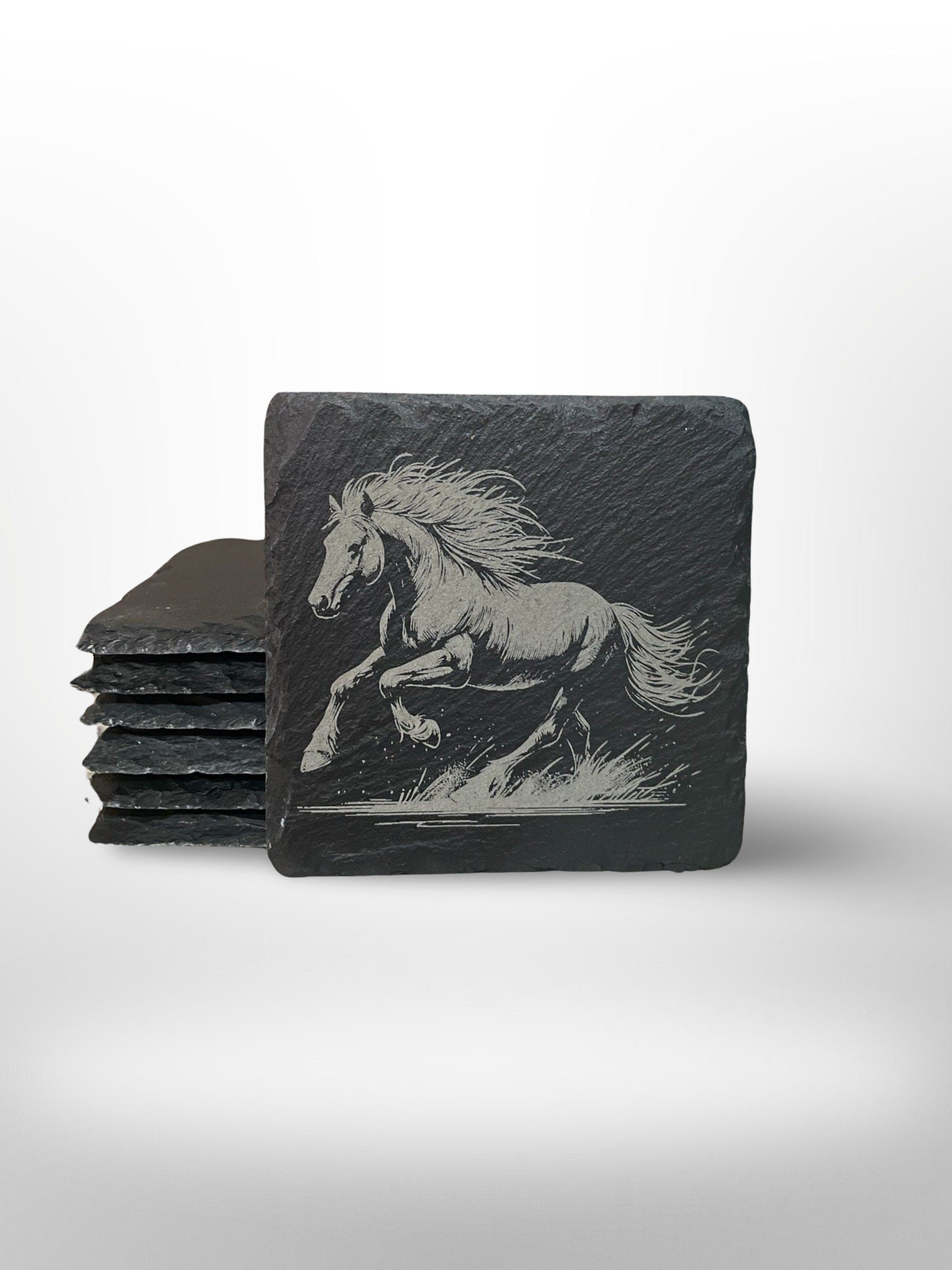 Slate coaster with a horse running on it
